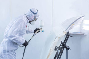 depositphotos_140388646-stock-photo-automobile-repairman-painter