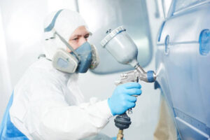 depositphotos_94164684-stock-photo-worker-painting-auto-car-body